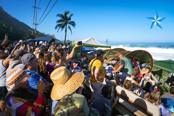 Crowds pack the North Shore to watch top surfers compete in ‘The Eddie’