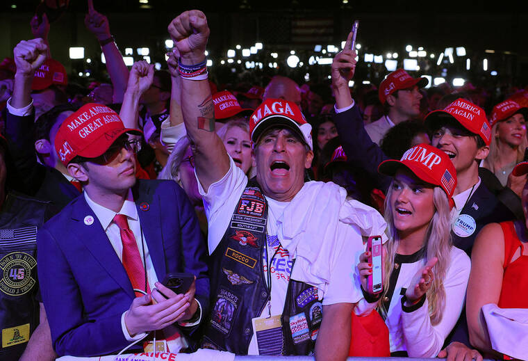 REUTERS/Brian Snyder Supporters of Republican presidential nominee and former U.S. President Donald Trump react at the site of the Election Night rally for Trump at the Palm Beach County Convention Center in West Palm Beach, Fla.