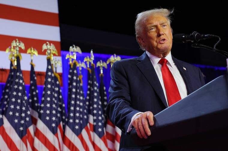 REUTERS/BRIAN SNYDER
                                Republican presidential nominee and former President Donald Trump addresses supporters at his rally, at the Palm Beach County Convention Center in West Palm Beach, Fla.