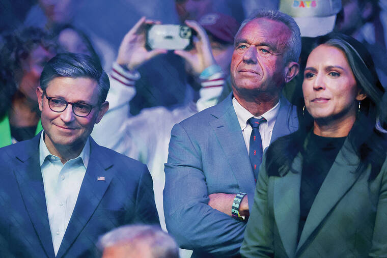 BRAD PENNER / IMAGN IMAGES / NOV. 16
                                U.S. House Speaker Mike Johnson, left, stands with Robert F. Kennedy Jr. and former U.S. Rep. Tulsi Gabbard during UFC 309 at Madison Square Garden.