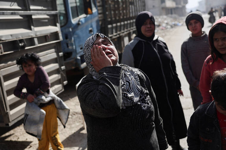 AMR ABDALLAH DALSH / REUTERS
                                An elderly woman reacts in Tadamon district, littered with bones after what residents and rights groups described as years of killings there under the rule of Syria’s Bashar al-Assad, following al-Assad’s ousting by fighters of the ruling Syrian body, in Damascus this week.