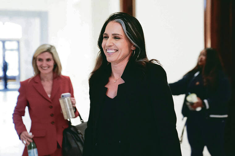 ELIZABETH FRANTZ / REUTERS
                                Tulsi Gabbard, President-elect Donald Trump’s nominee to be director of national intelligence, walks through Capitol Hill in Washington on Tuesday.