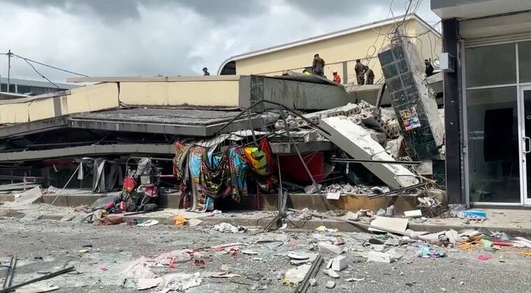 JEREMY ELLISON/VIA REUTERS
                                Rubble lies around a collapsed building following a strong earthquake in Port Vila, Vanuatu, December 17, 2024, in this screengrab taken from a social media video.