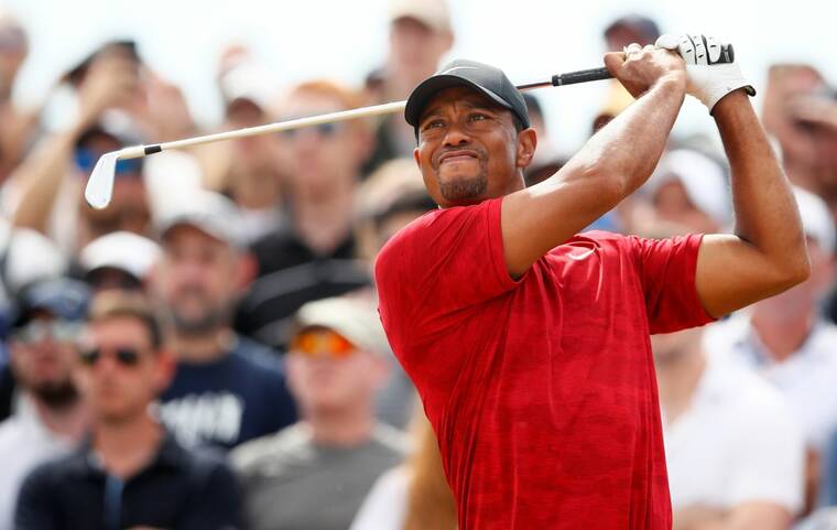 REUTERS/JASON CAIRNDUFF/ FILE PHOTO
                                Tiger Woods in action during the final round of the 147th Open Championship in Carnoustie, Britain, in July 2018.