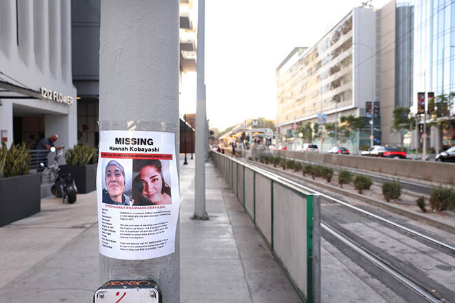 WALLY SKALIJ/LOS ANGELES TIMES
                                Flyers of missing Maui woman Hannah Kobayashi hang near the metro station, on Nov. 21, where she was last seen in Downtown Los Angeles. Kobayashi has returned to the United States after disappearing for weeks and then being tracked down in Mexico, according to a report published today.