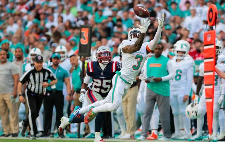 SAM NAVARRO-IMAGN IMAGES/ FILE PHOTO
                                Miami Dolphins wide receiver Odell Beckham Jr. dives but cannot make a catch, on Nov. 24, against New England Patriots cornerback Marcus Jones during the third quarter at Hard Rock Stadium in Miami Gardens, Fla.