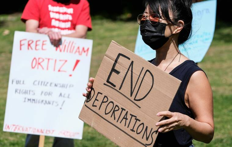 REUTERS/RINGO CHIU/FILE PHOTO
                                Protesters holding signs take part in a rally to demand the end of deportations in U.S. immigration policy, at Silver Lake Reservoir in Los Angeles, Calif., in March 2021. U.S. deportations of immigrants rose in the past year to the highest level since 2014, according to a U.S. government report released today, part of a broader push by outgoing President Joe Biden to reduce illegal immigration.