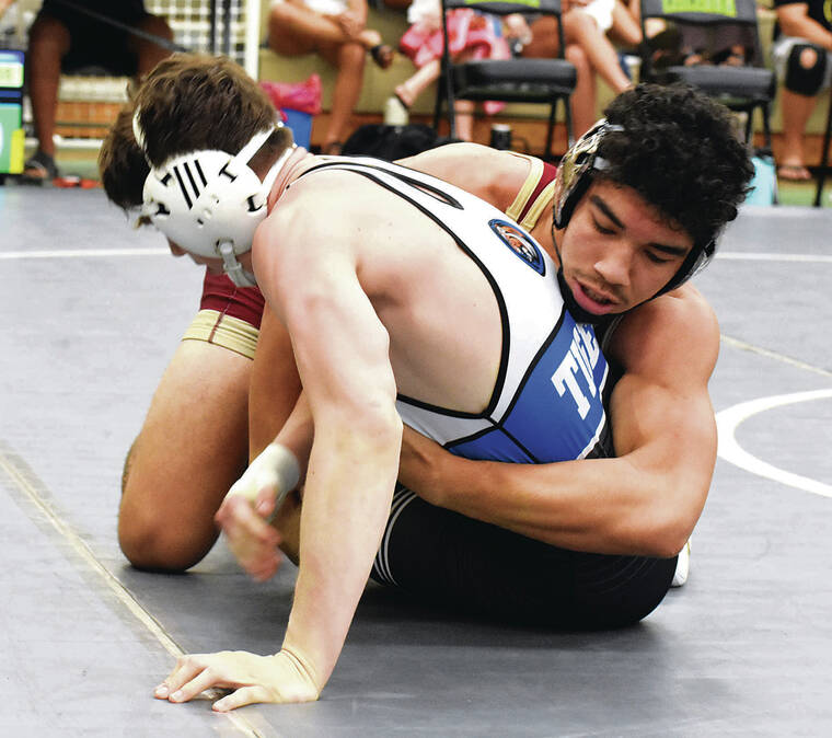 Packed house inspires wrestlers at Hawaii tournament