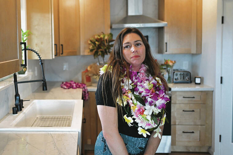 ANDREW VLIET / SPECIAL TO THE STAR-ADVERTISER
                                Ariel Ah Hee reflects on the effort and support that it took for her family to rebuilt their house after the Lahaina wildfire destroyed their previous home at the same location 15 months ago.