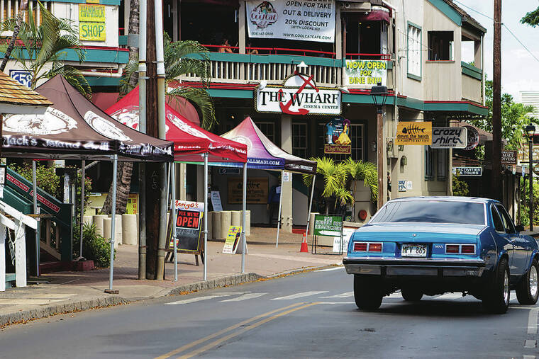 STAR-ADVERTISER / 2020
                                A survey of Lahaina residents showed a preference to rebuild the historic town as it was before the Aug. 8, 2023, wildfire, but to modern- day standards. Front Street, where numerous shops and restaurants operated, was long a popular stop for visitors and local residents.