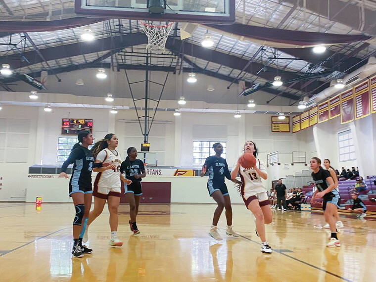 PAUL HONDA / PHONDA@STARADVERTISER.COM
                                Rebekah Lum Kee of Maryknoll scores on a layup against El Capitan (Merced, Calif.) in the second quarter Wednesday afternoon at Maryknoll Community Center.