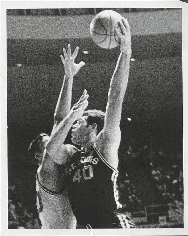 COURTESY PHOTO
                                Jim Nicholson was a star high school football and basketball player. He later went on to play for Michigan State and the Kansas City Chiefs for six seasons.