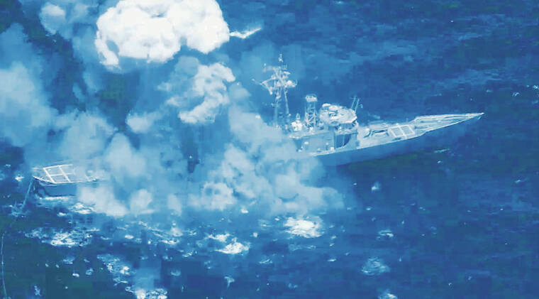 COURTESY U.S. NAVY VIDEO / 2022
                                Military forces from Australia, Canada, Malaysia and the U.S. fired upon and sunk the decommissioned USS Rodney M. Davis during a sinking exercise as part of the 2022 Rim of the Pacific to gain proficiency in tactics, targeting and live firing against a surface target at sea. In Hawaii, sinking exercises are required to be conducted at least 50 nautical miles from shore and in waters at a depth of at least 6,000 feet.