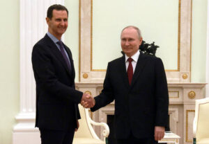 Putin denies Russian defeat in Syria, plans to meet Assad